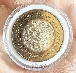 2005 MEXICO 100 Years of MONETARY REFORM Center is Silver 100 Peso Coin i111306