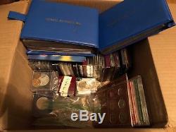 A Box of Coin Sets and Coins (some silver) from around the world See the list