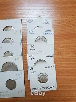 A Collection of 25 Vintage Silver World Coins