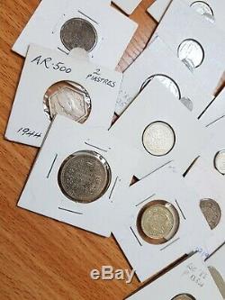 A Collection of 25 Vintage Silver World Coins