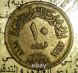 A group of Egyptian Arab metal coins (silver copper) and rare banknotes dating