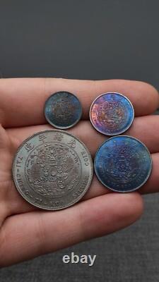 A suit of 1906 Qing Dynasty Kuang-Hsu Silver Coin Hu-Poo Dragon Money
