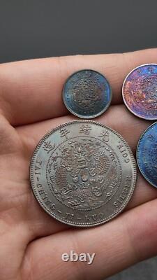 A suit of 1906 Qing Dynasty Kuang-Hsu Silver Coin Hu-Poo Dragon Money