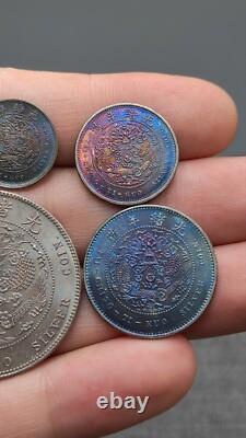 A suit of 1906 Qing Dynasty Kuang-Hsu Silver Coin Hu-Poo Dragon Money