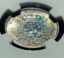 Belgium 1880 Franc Fantastic blue/violet/orange toning. NGC AU details
