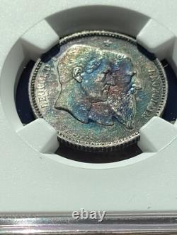 Belgium 1880 Franc Fantastic blue/violet/orange toning. NGC AU details