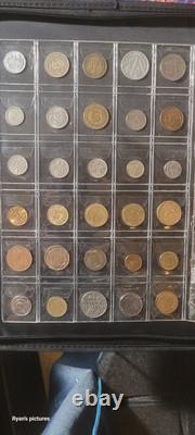 Book complete with 200 foreign coins. Tons of old coins. Possibly some silver
