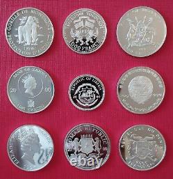 Collection of 9 SILVER coins with animals (Congo, Togo, Uganda, Zambia, Liberia)