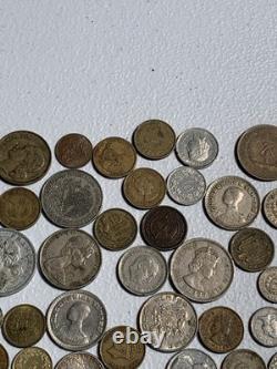 Estate Lot Of Foreign Coins Including Coin Silver, 60%, Thailand Bahts & More
