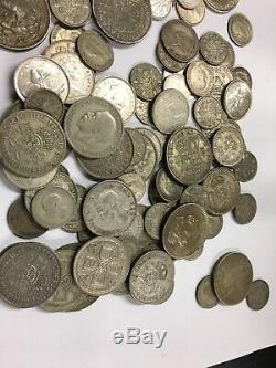 Lot of 100 Silver Coins from around the World 525 grams