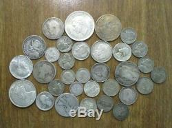 Lot of 32 Silver US and World Coins-9 Ounces-Mostly Circulated