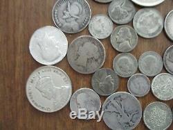 Lot of 32 Silver US and World Coins-9 Ounces-Mostly Circulated