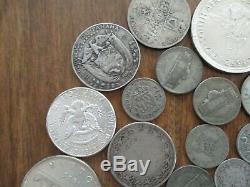 Lot of 32 Silver US and World Coins-9 Ounces-Mostly Circulated