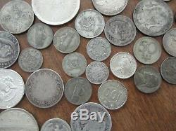 Lot of 32 Silver US and World Coins-9 Ounces-Mostly Circulated