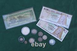 Miscellaneous lot of Guatemalan banknotes & silver coins incl. One 1896 Un Peso