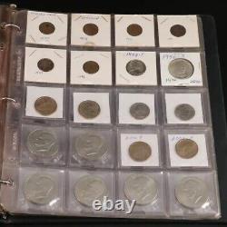 Notebook With One Hundred Forty U. S. And Foreign Coins in 2x2 Holders