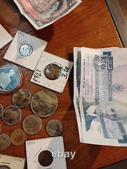 Over 300 Coins From Around The World. And Cash Just Added More