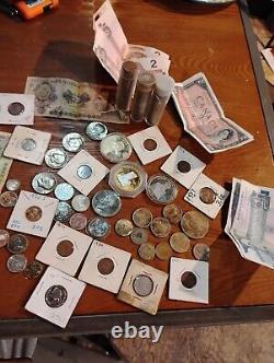 Over 300 Coins From Around The World. And Cash Just Added More
