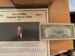 Postal Commemorative Society Tri-Fold $1 $2 & $5 Currency withStamps & Coins