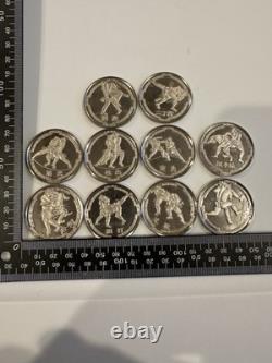 Rare Sumo Coins- Lot Of 10- Silver In Color
