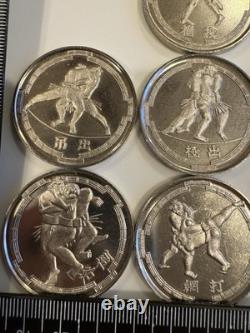 Rare Sumo Coins- Lot Of 10- Silver In Color